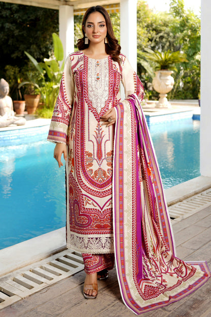 Woman in a traditional outfit standing by a pool with a garden view.